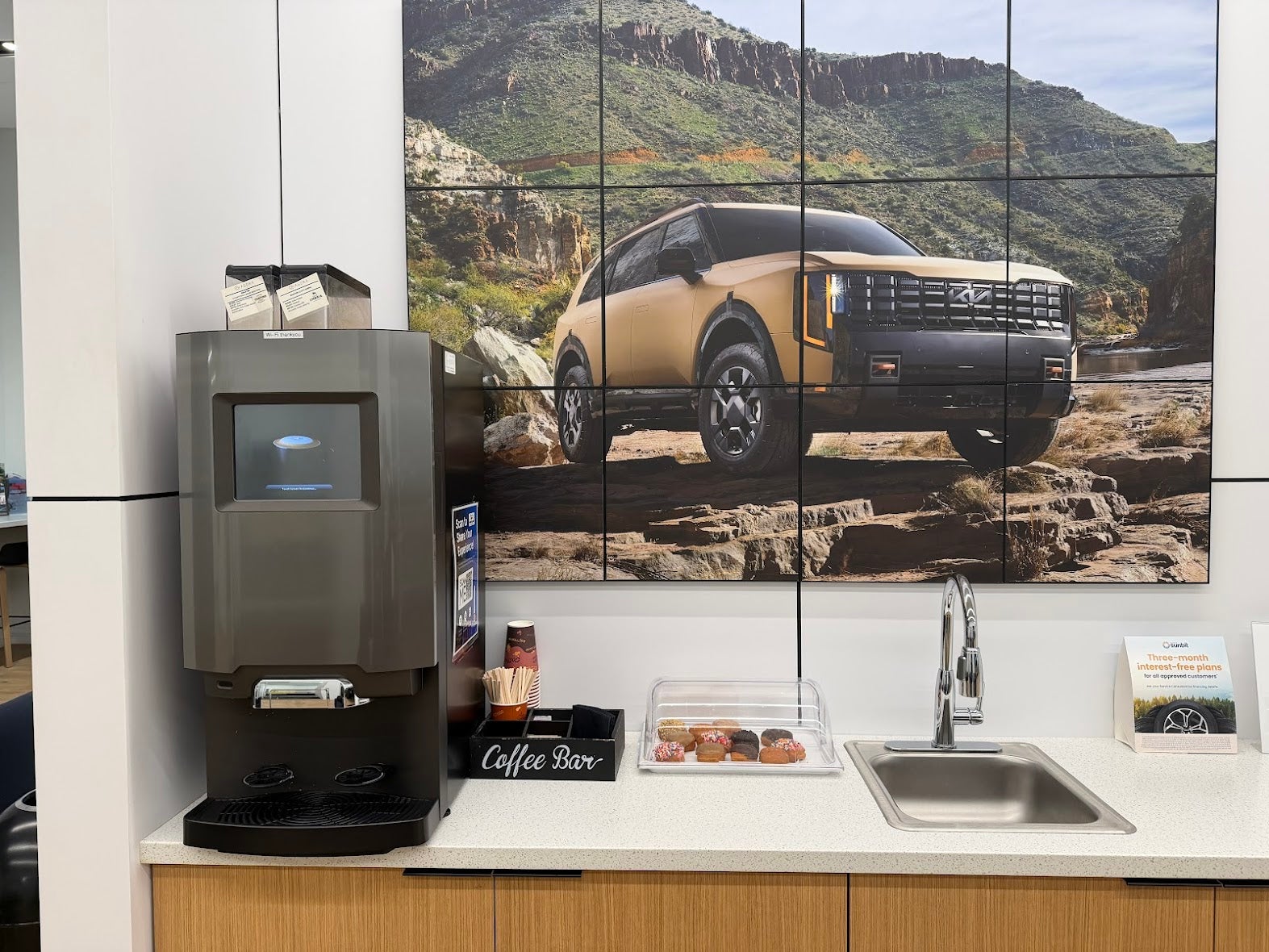 Kia of Portland coffee bar with fresh donuts for service customers